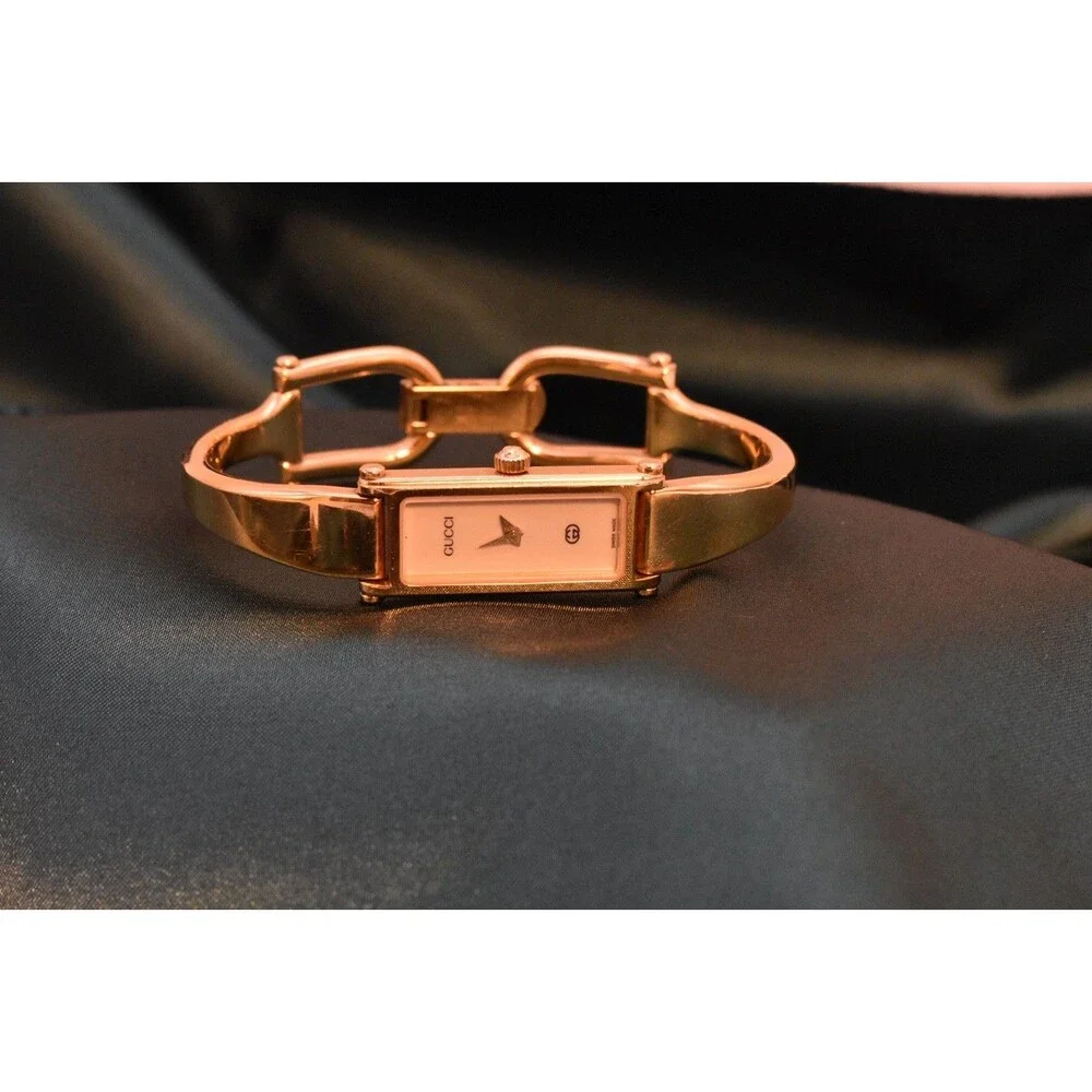 Vintage Gucci 1500L Ladies Gold Tone Bangle Watch Cream Dial Swiss Quartz